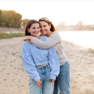 mom and daughter on beach